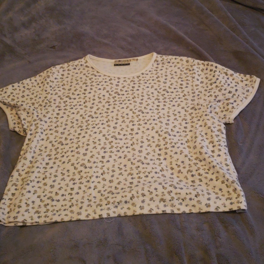 White shirt with blue and tan flowers